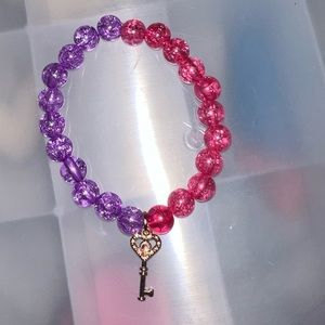 pink and purple beaded bracelet